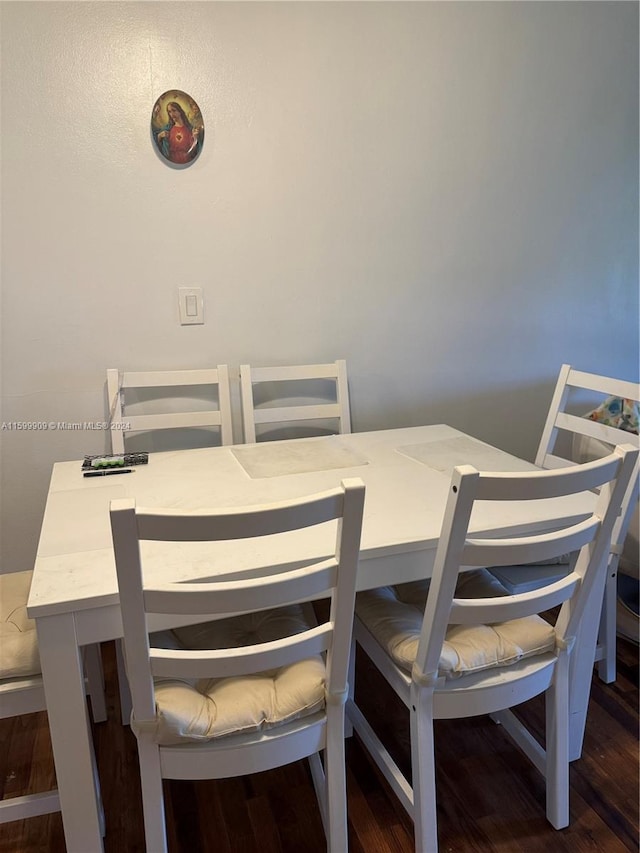 dining area featuring wood finished floors