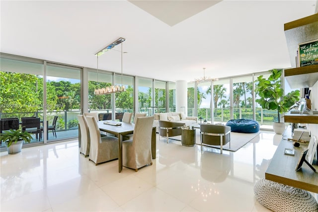 tiled dining area with a notable chandelier and expansive windows