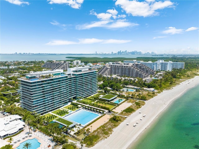 bird's eye view with a view of the beach and a water view