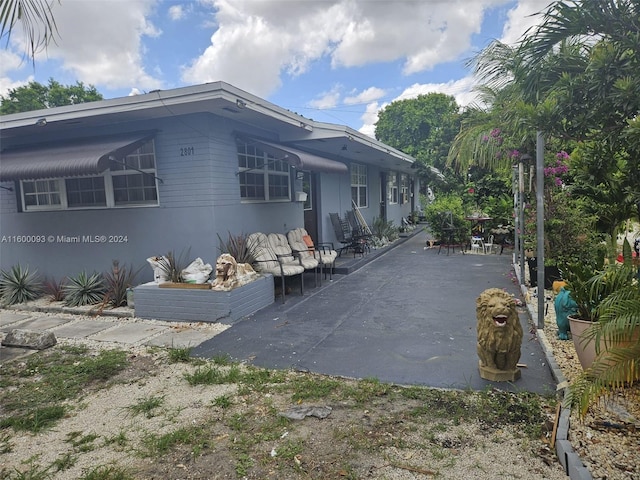 view of home's exterior with a patio