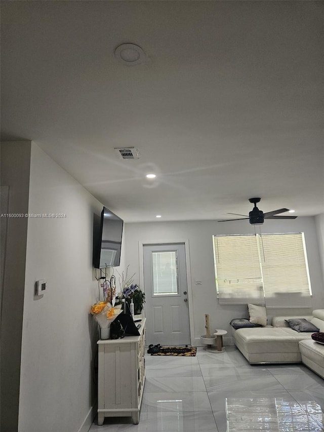 foyer entrance with a ceiling fan, baseboards, visible vents, recessed lighting, and marble finish floor