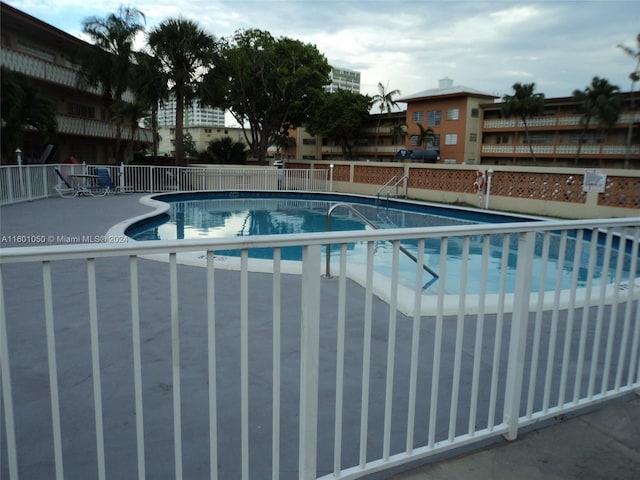 11855 NE 19th Dr Unit 5, North Miami, FL 33181 - community pool with a patio area