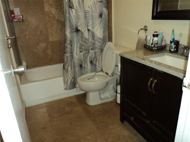 full bathroom featuring tile flooring, vanity, toilet, and shower / tub combo