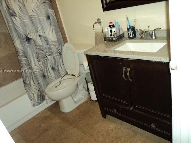 full bathroom featuring tile floors, shower / tub combo with curtain, toilet, and vanity