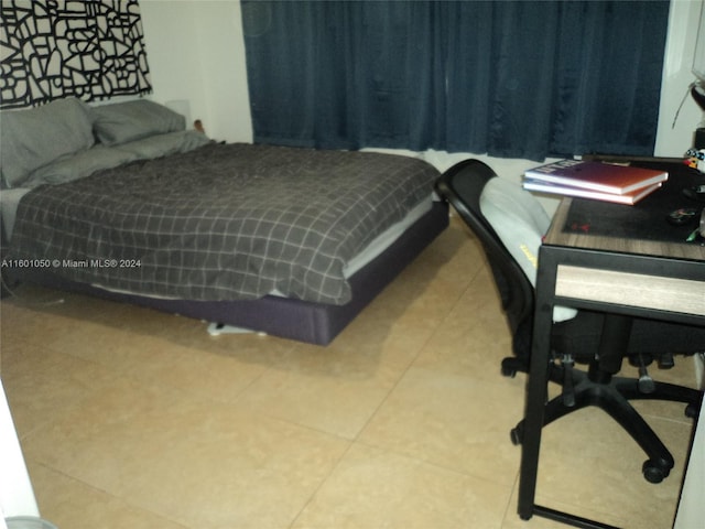 11855 NE 19th Dr Unit 5, North Miami, FL 33181 - bedroom featuring tile patterned flooring