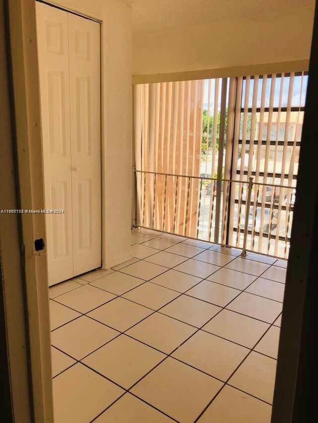 view of tiled spare room