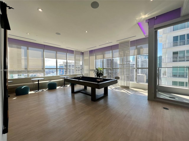 game room featuring hardwood / wood-style flooring and pool table