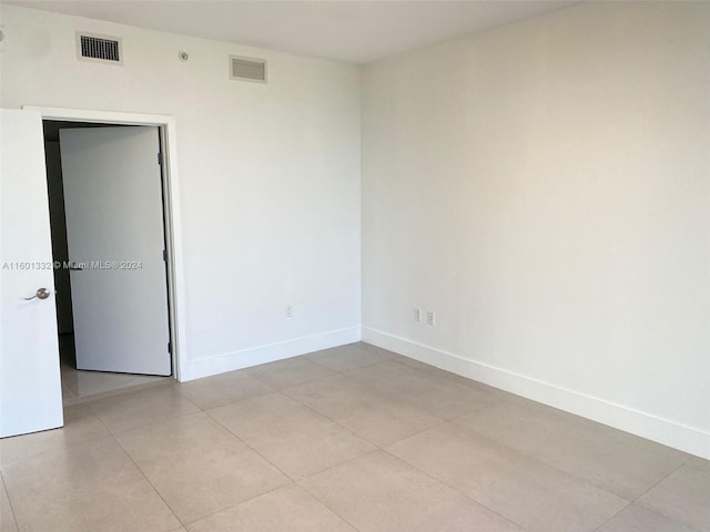 view of tiled spare room