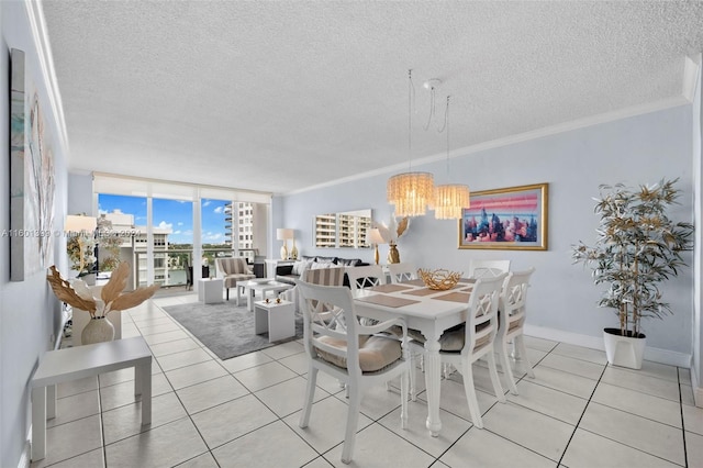 dining space featuring a textured ceiling, a chandelier, floor to ceiling windows, and tile patterned flooring