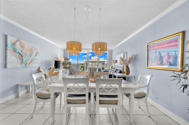 tiled dining room with crown molding, baseboards, an inviting chandelier, and a textured ceiling