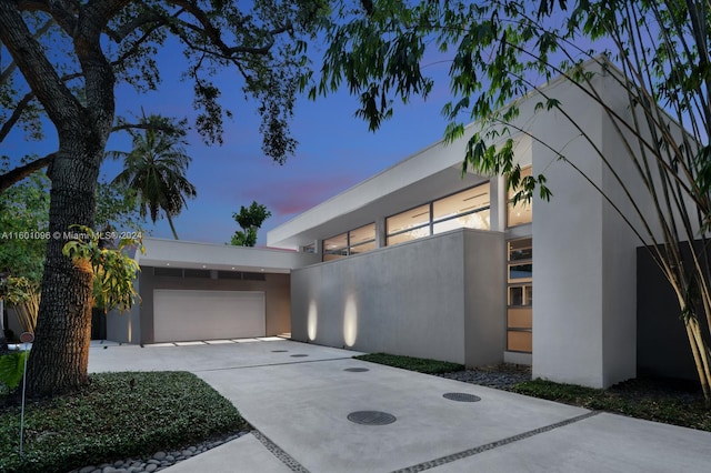 modern home featuring a garage