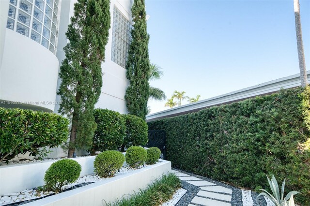 exterior space with a water view and a community pool