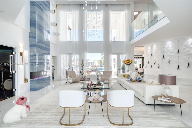 living room with a towering ceiling