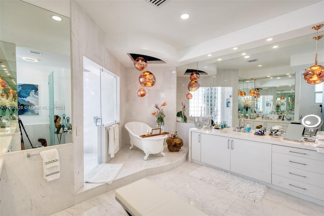 bathroom with shower with separate bathtub, vanity, and tile walls