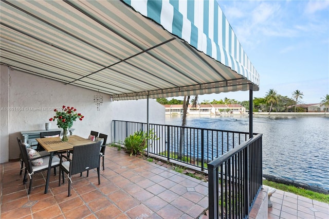 view of patio featuring a water view