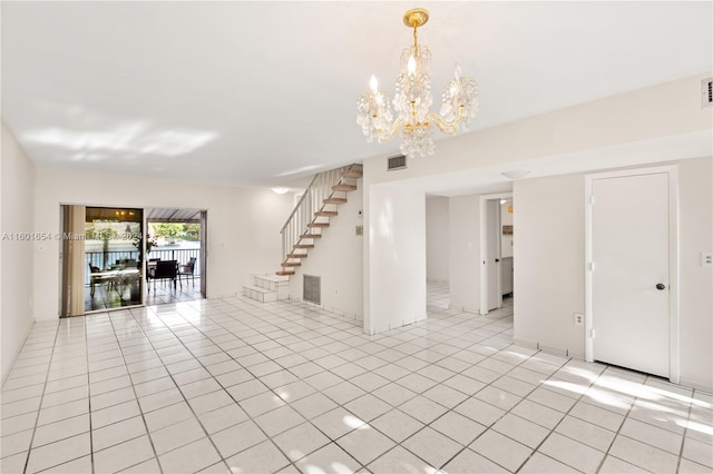 interior space with an inviting chandelier and light tile floors