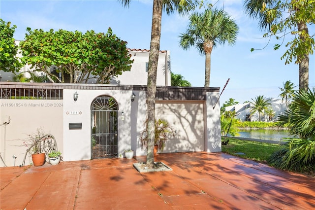 view of patio / terrace with a garage