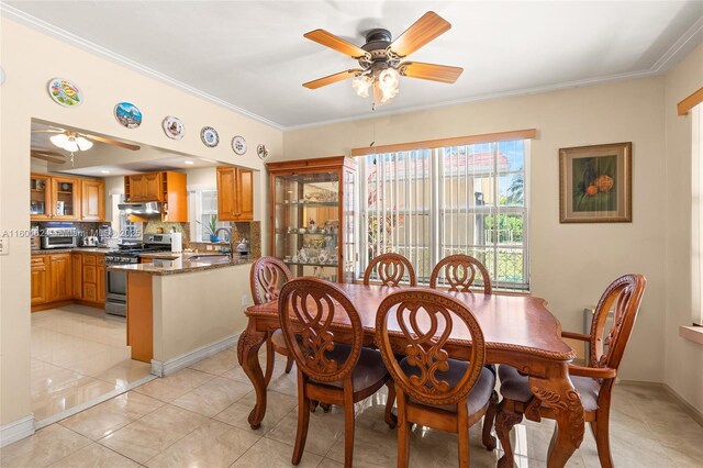 living room with crown molding and sink