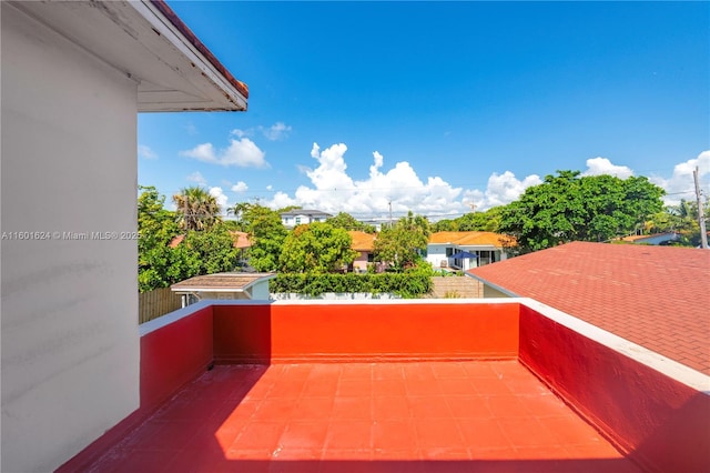 view of patio featuring a balcony