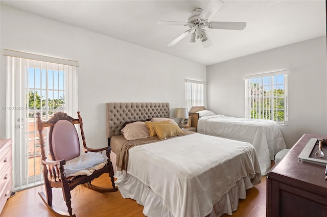 bedroom featuring ceiling fan and hardwood / wood-style floors