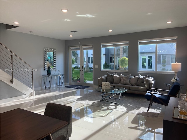 living area featuring french doors, tile patterned floors, and recessed lighting