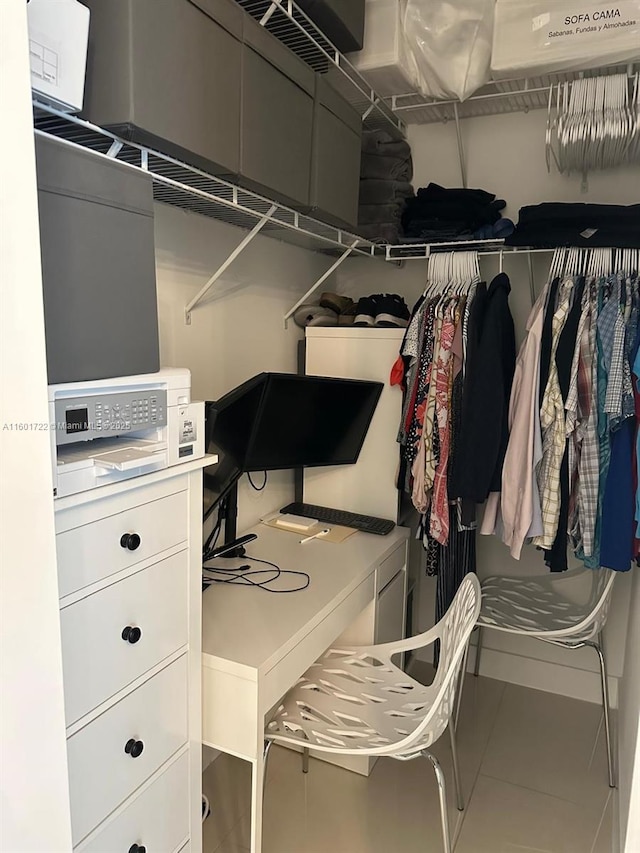 spacious closet with tile patterned flooring