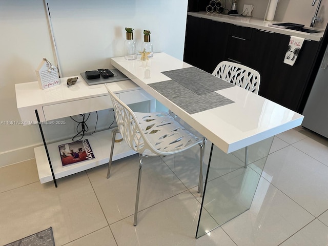 dining area with light tile patterned flooring