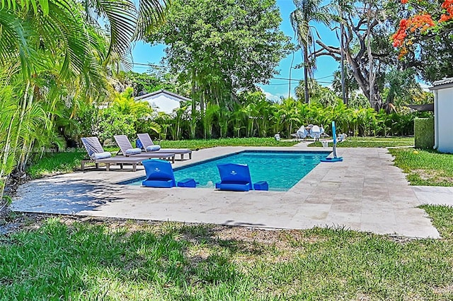outdoor pool featuring a patio area
