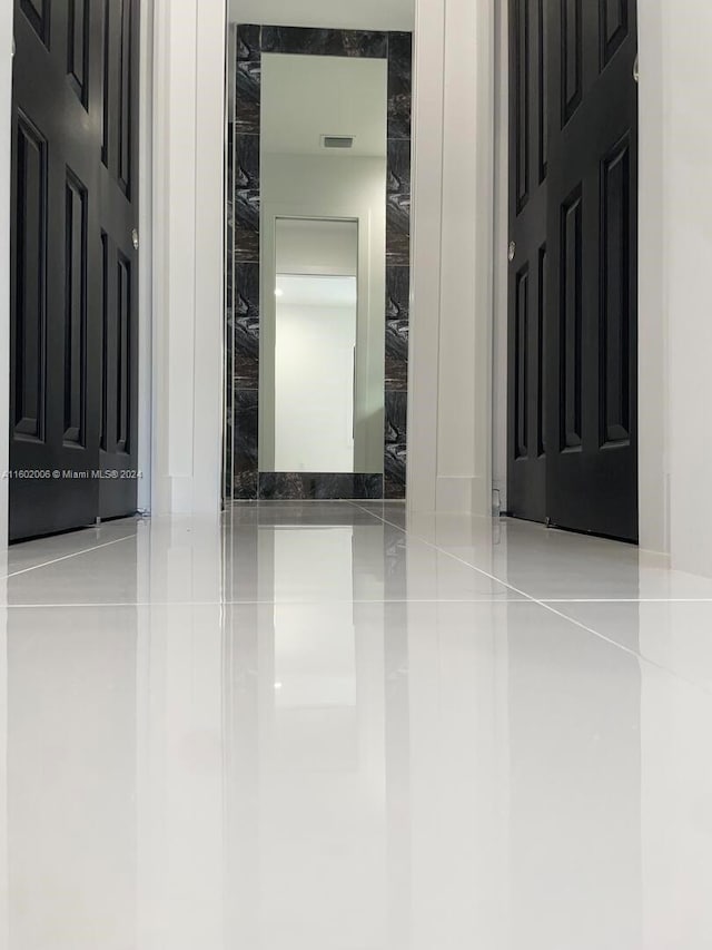 interior space featuring light tile patterned floors