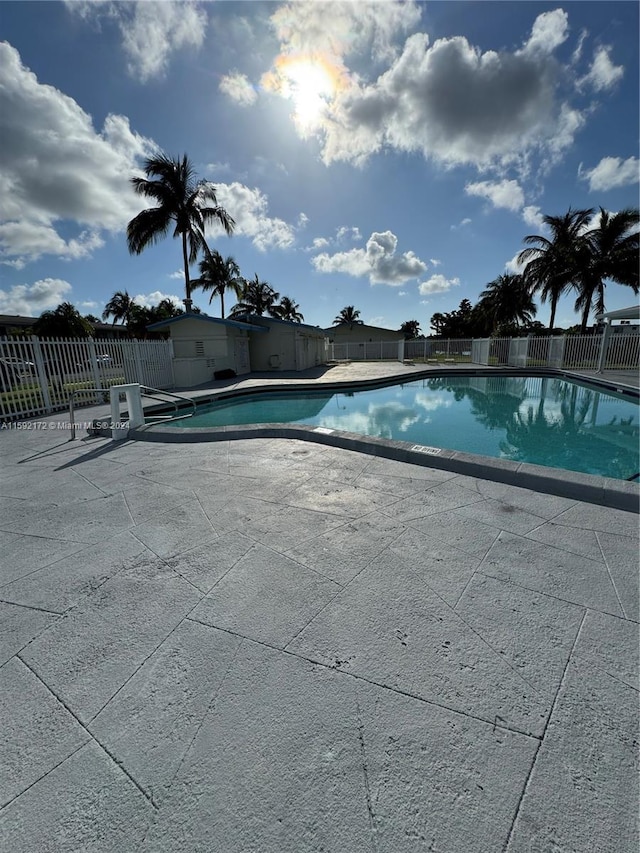 view of swimming pool featuring a patio