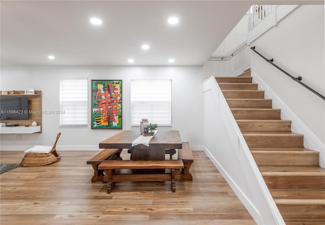 dining space with light wood-type flooring