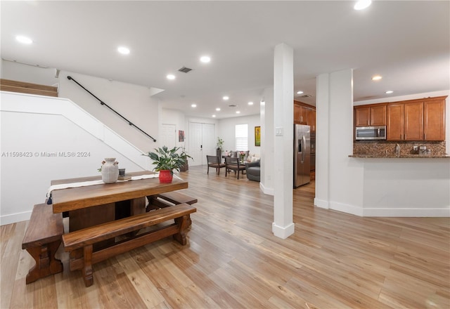 dining area featuring light hardwood / wood-style floors