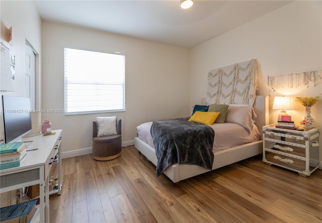 bedroom featuring light wood-type flooring