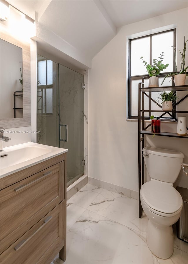 bathroom featuring walk in shower, vanity, toilet, and vaulted ceiling