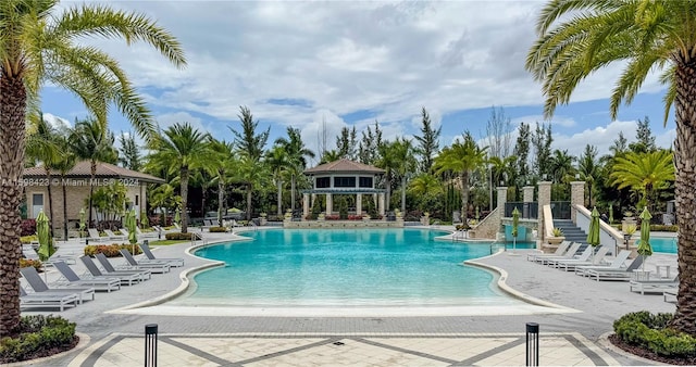 view of swimming pool featuring a patio area