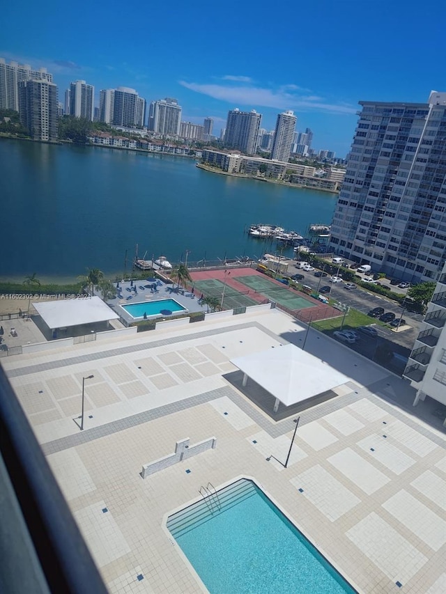 drone / aerial view with a water view