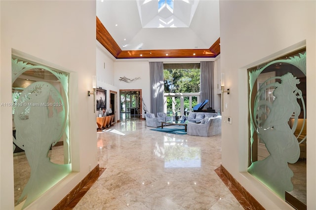 corridor featuring french doors and high vaulted ceiling