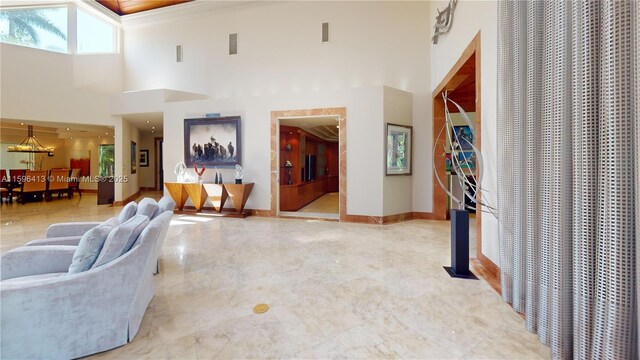 living room featuring high vaulted ceiling, plenty of natural light, and wooden ceiling