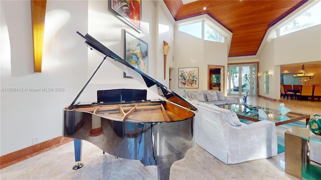 living room with high vaulted ceiling, crown molding, and wood ceiling