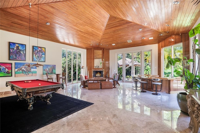 game room with wooden ceiling, a fireplace, billiards, and a high ceiling