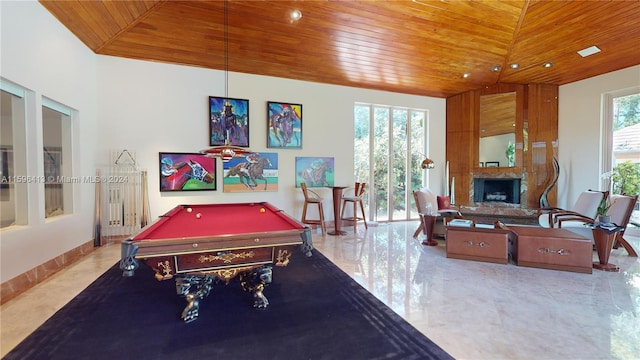 game room featuring tile patterned floors, a large fireplace, wooden ceiling, and pool table