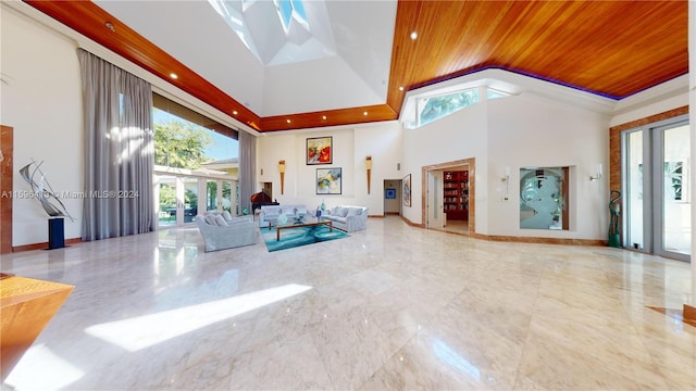 living room featuring high vaulted ceiling, a healthy amount of sunlight, and wood ceiling