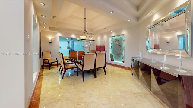 dining space with a tray ceiling