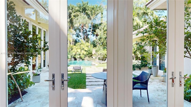 doorway to outside featuring french doors