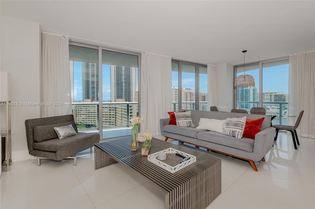 tiled living area featuring a wall of windows and a city view