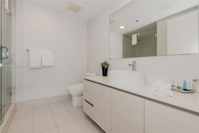 bathroom featuring a shower stall, visible vents, and tile patterned floors