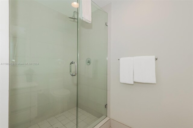 full bathroom with a stall shower