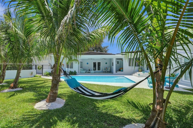 4705 Granada Blvd, Coral Gables, FL 33146 - view of pool featuring ceiling fan, a yard, and a patio
