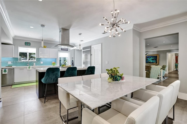 tiled dining area with an inviting chandelier and crown molding