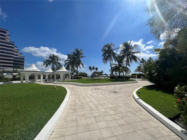 surrounding community featuring a yard and a gazebo